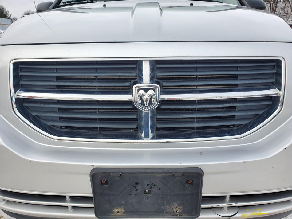 Grille (black/chrome)(some chrome peel) 2007-2010 Dodge Caliber