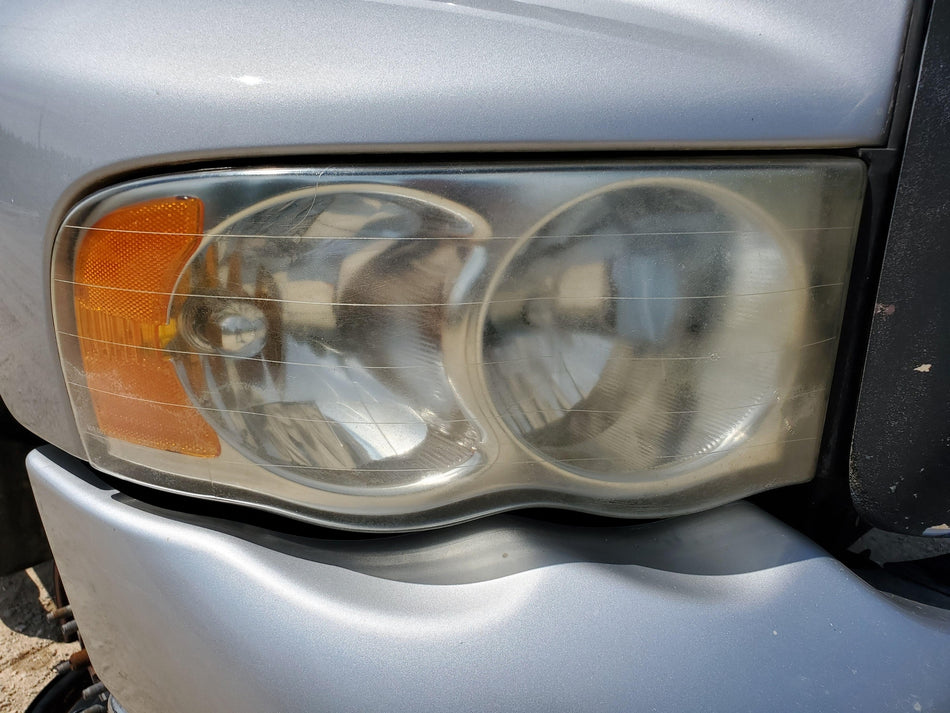 2002-2005 Dodge Ram 1500 Front RH Headlight Assembly (faded) OEM