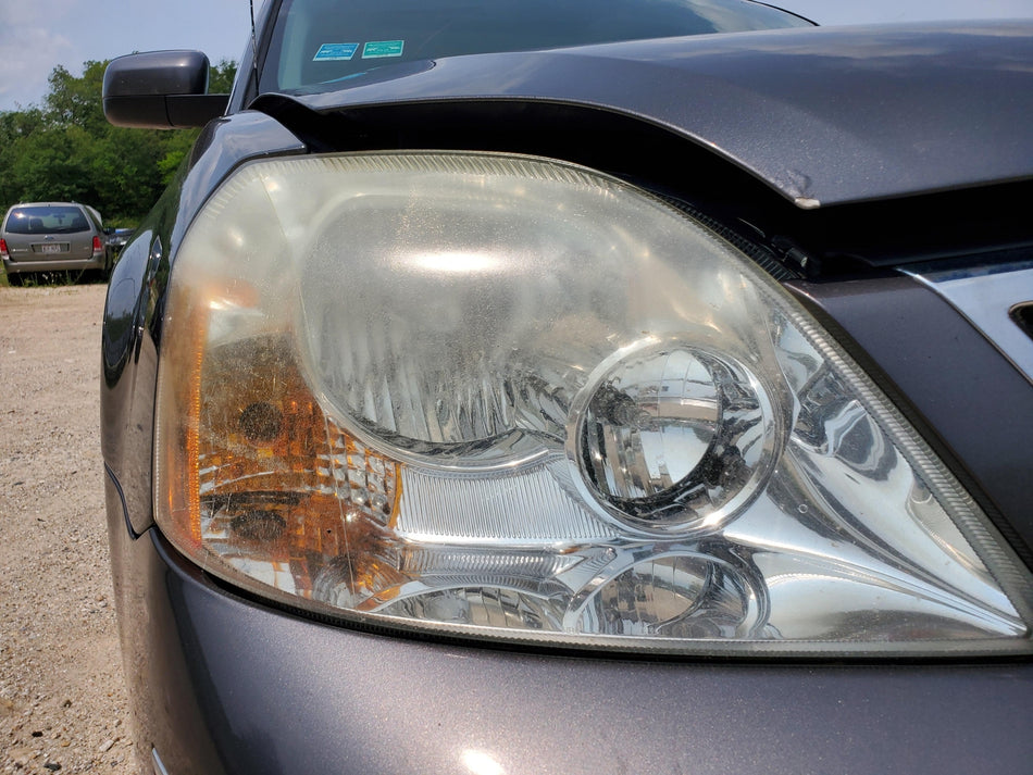 2005-2007 Ford Five Hundred Front RH Headlight Assembly (halogen)(cloudy OEM
