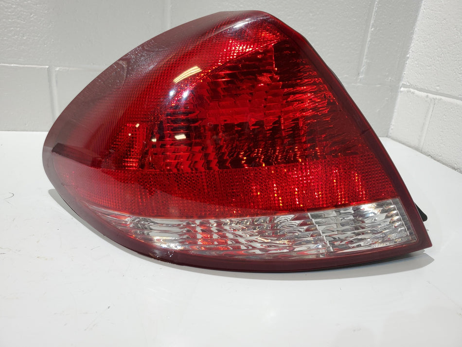 2005-2007 Ford Taurus LH Rear Tail Light Aftermarket 04 OEM