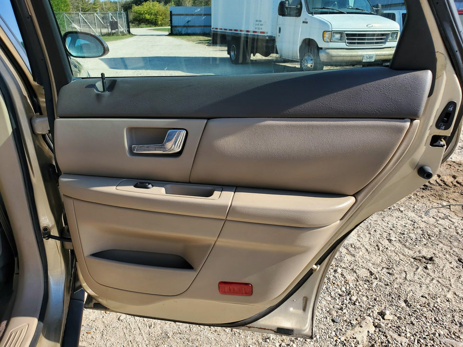 2000-2003 Ford Taurus Rear RH Inside Door Panel (leather seperating OEM