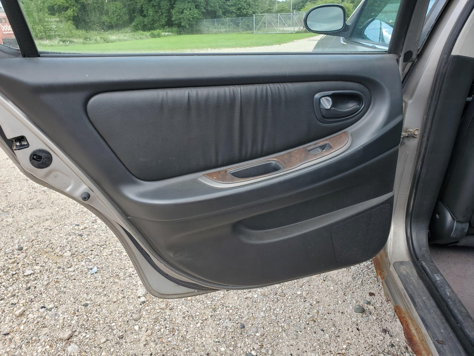 2000-2001 Nissan Maxima Rear LH Inside Door Panel (black) (with o