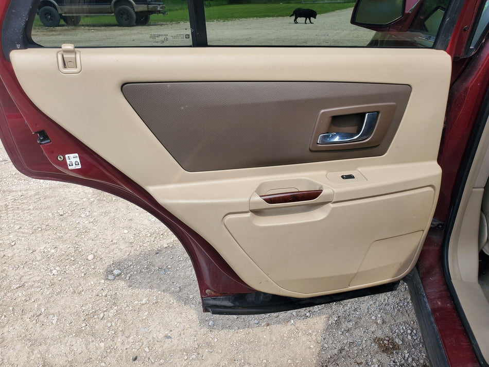 2004-2009 Cadillac Rear LH Inside Door Panel (33 Cashmere)(with o