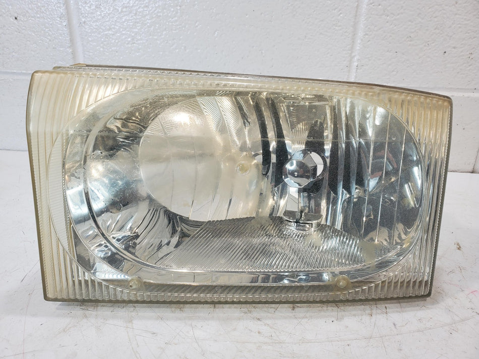 2002-2004 Ford F250 F350 F450 F550 LH Headlight Assembly Cloudy OEM