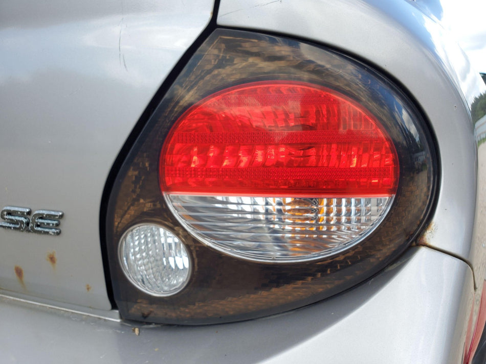 2000-2001 Nissan Maxima SE Rear RH Tail Light Assembly (scuff/crack)
