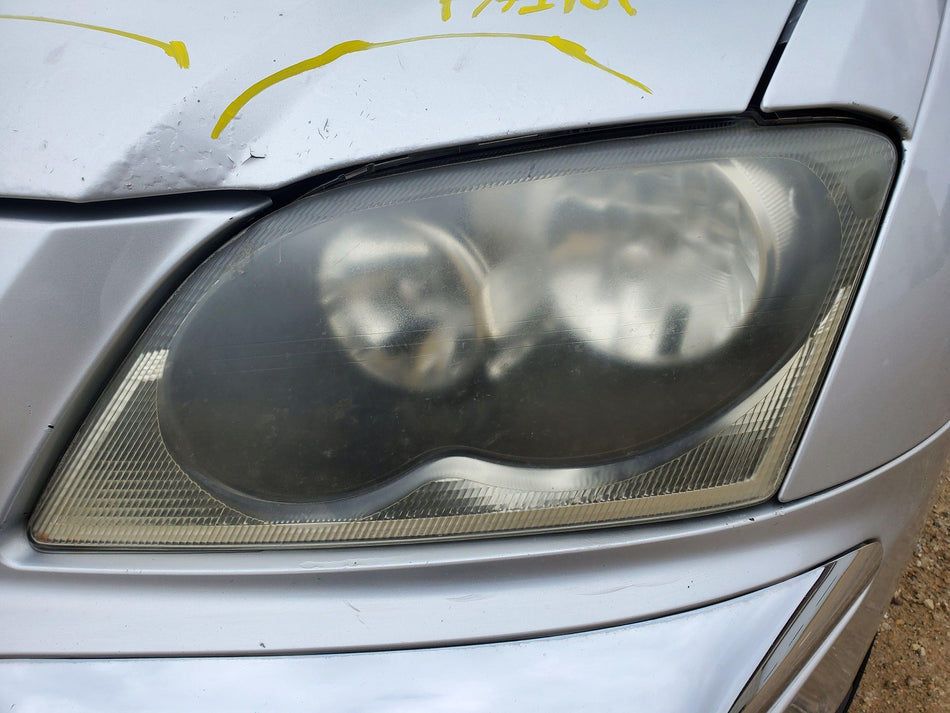 LeftLHHeadlightAssembl (halogen)(quad)(from 6/10/03) 2004-2006 ChryslerPacifica