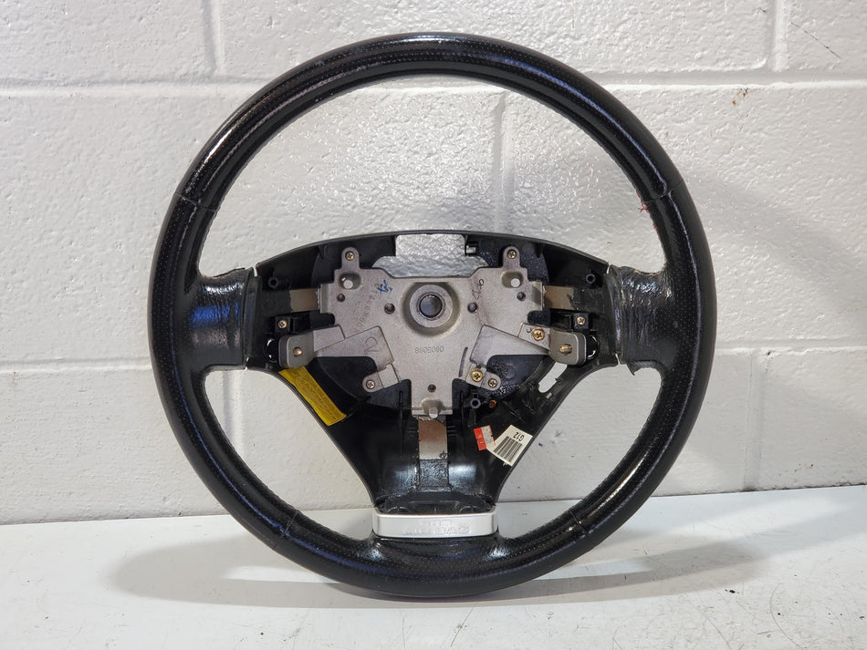 2003-2006 Hyundai Tiburon Steering Wheel (black)(leather)(stitch coming apart