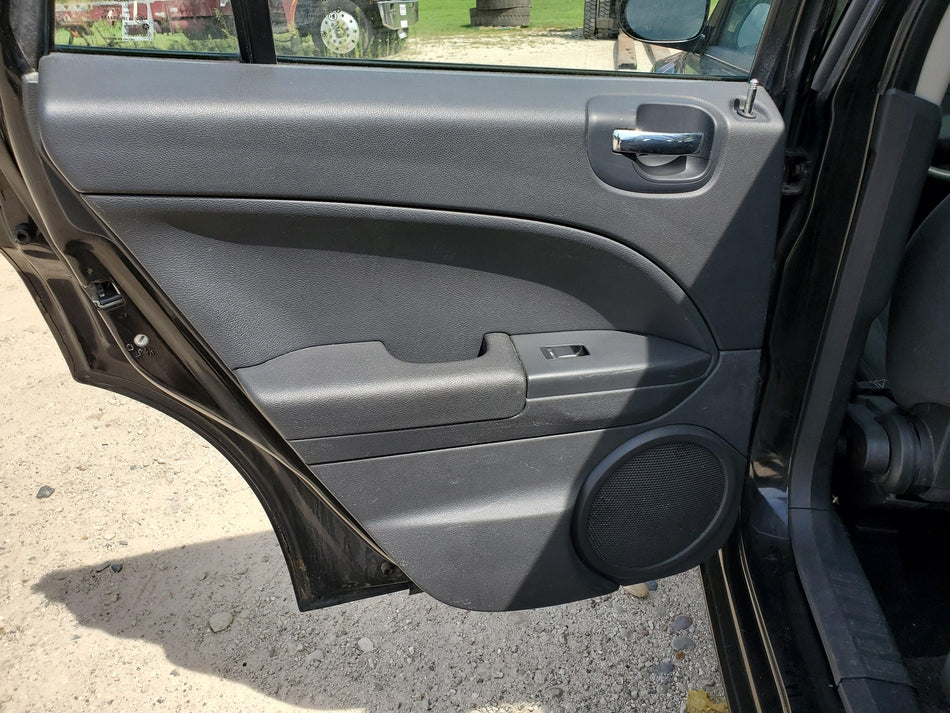2011-2012 Dodge Caliber Rear LH Inside Door Trim Panel (w/o handle & switches