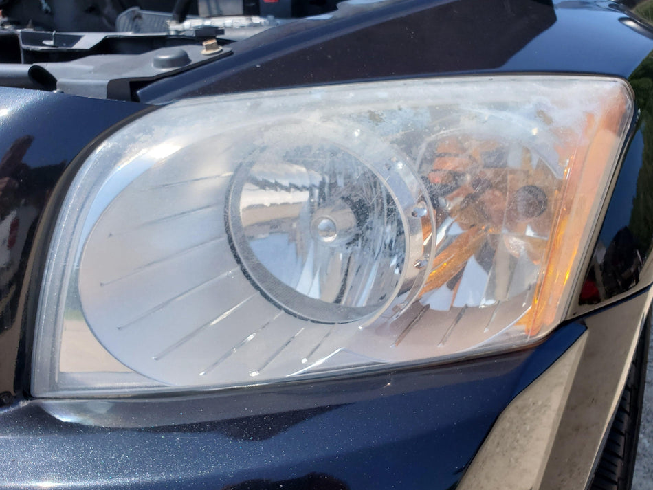 2007-2012 Dodge Caliber LH Driver Side Head Light Assembly (hazy