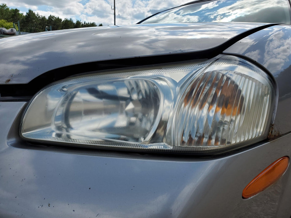 2000-2001 Nissan Maxima Front LH Headlight Assembly (from 9/99) OEM